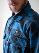 Load image into Gallery viewer, glacier raft company logo on blue plaid fleece