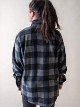 Load image into Gallery viewer, female model showing back of glacier raft company grey plaid fleece