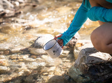 Load image into Gallery viewer, girl filling glacier raft company ceramic mug