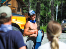 Load image into Gallery viewer, Glacier Raft Company guide wearing our flat brim mountain scene hat