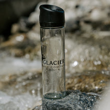 Load image into Gallery viewer, glass water bottle with glacier raft company logo
